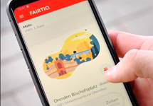 Handy mit FAIRTIQ App